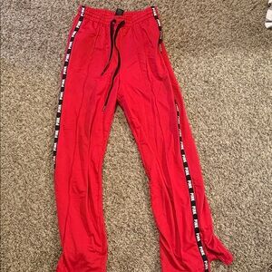 Red Track Pants with Side Stripes